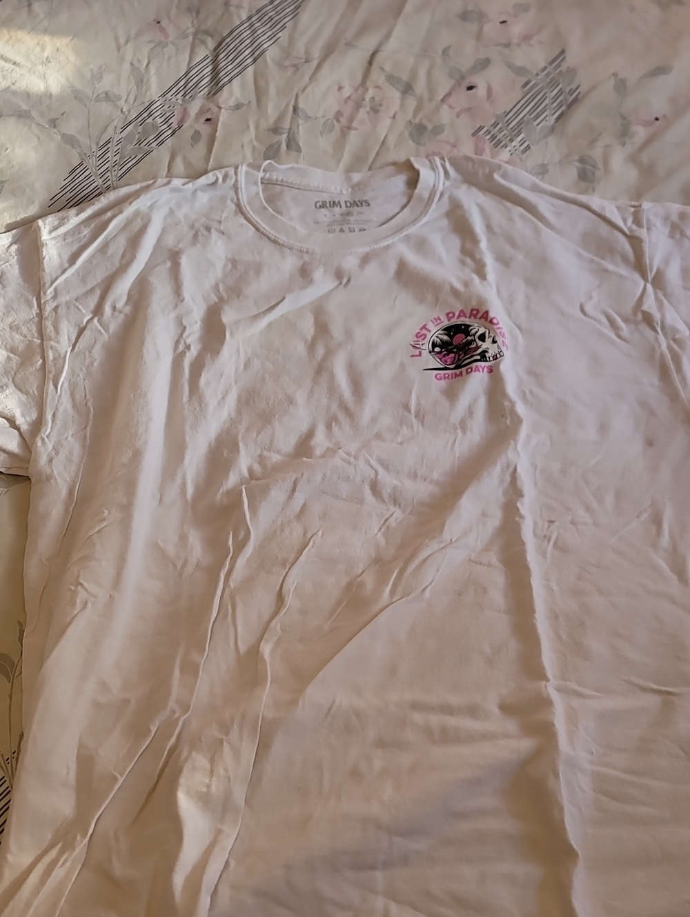Zumiez White Graphic Short Sleeve Tee with Pink and Black Logo